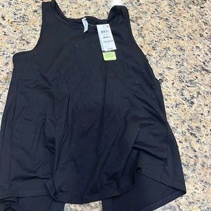 Open back “ Ideology “ shirt. Brand New, never worn. Size small